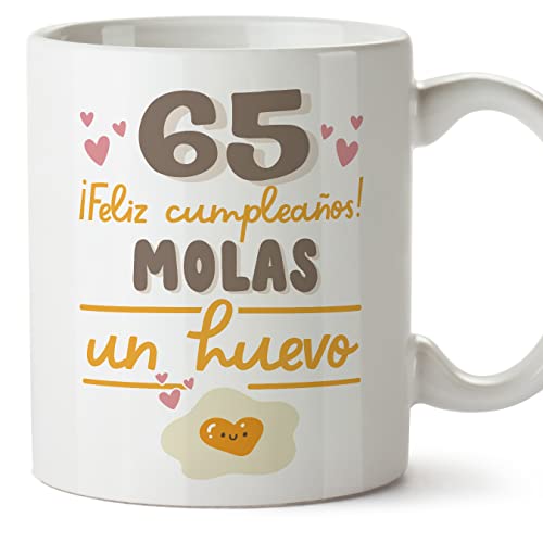 Consigue ahora MUGFFINS Tazas 65 Cumpleaños - En Español Catálogo - Feliz Cumpleaños Molas un Huevo - 11 oz / 330 ml - Regalo original y divertido Top Precio 2023 | regaloscumple.com